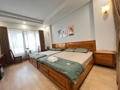 Chambre Deluxe familiale — NEW LAND Apartment 2 - Phu My Hung